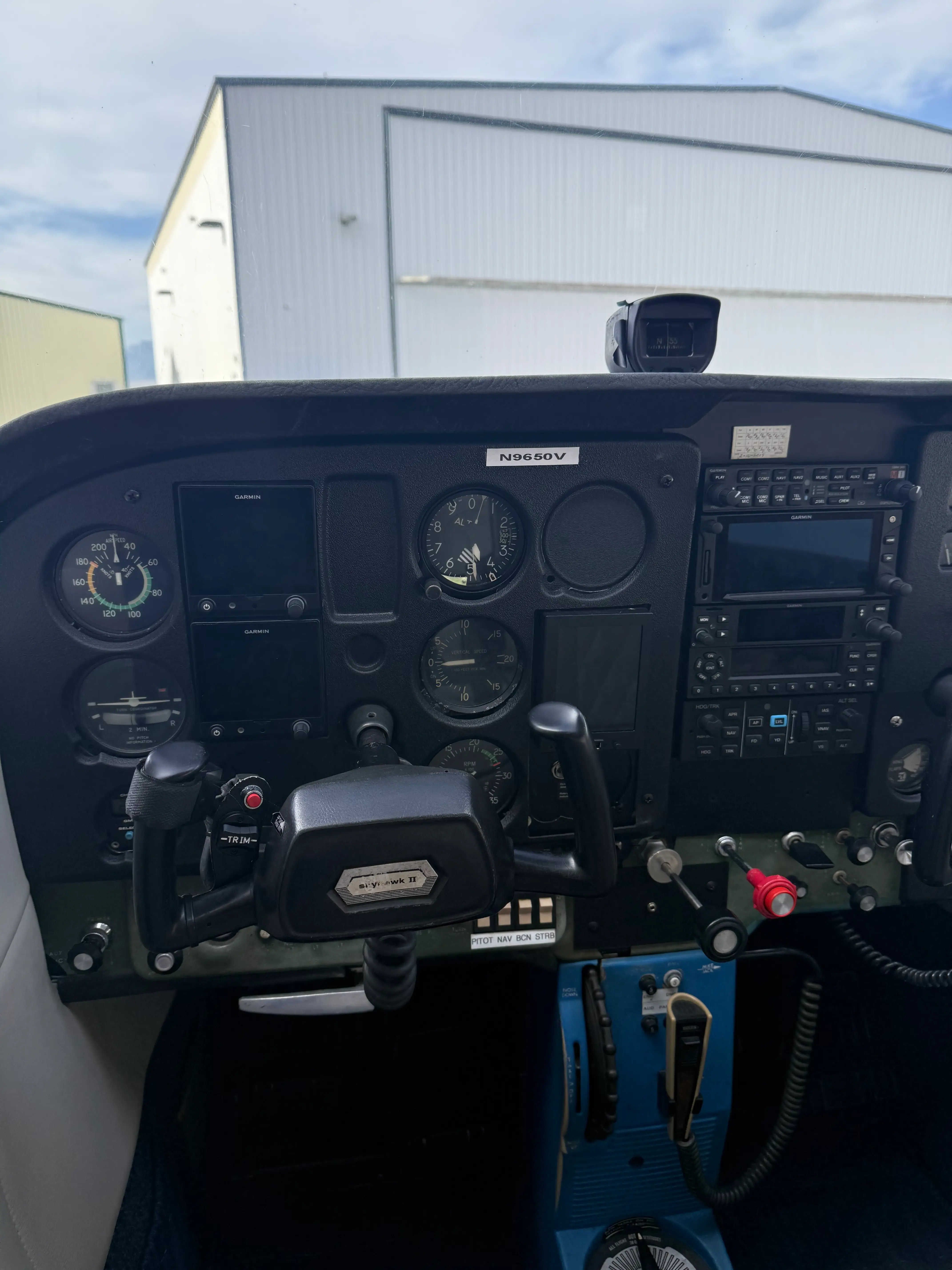 Cessna 172M cockpit with avionics panel
