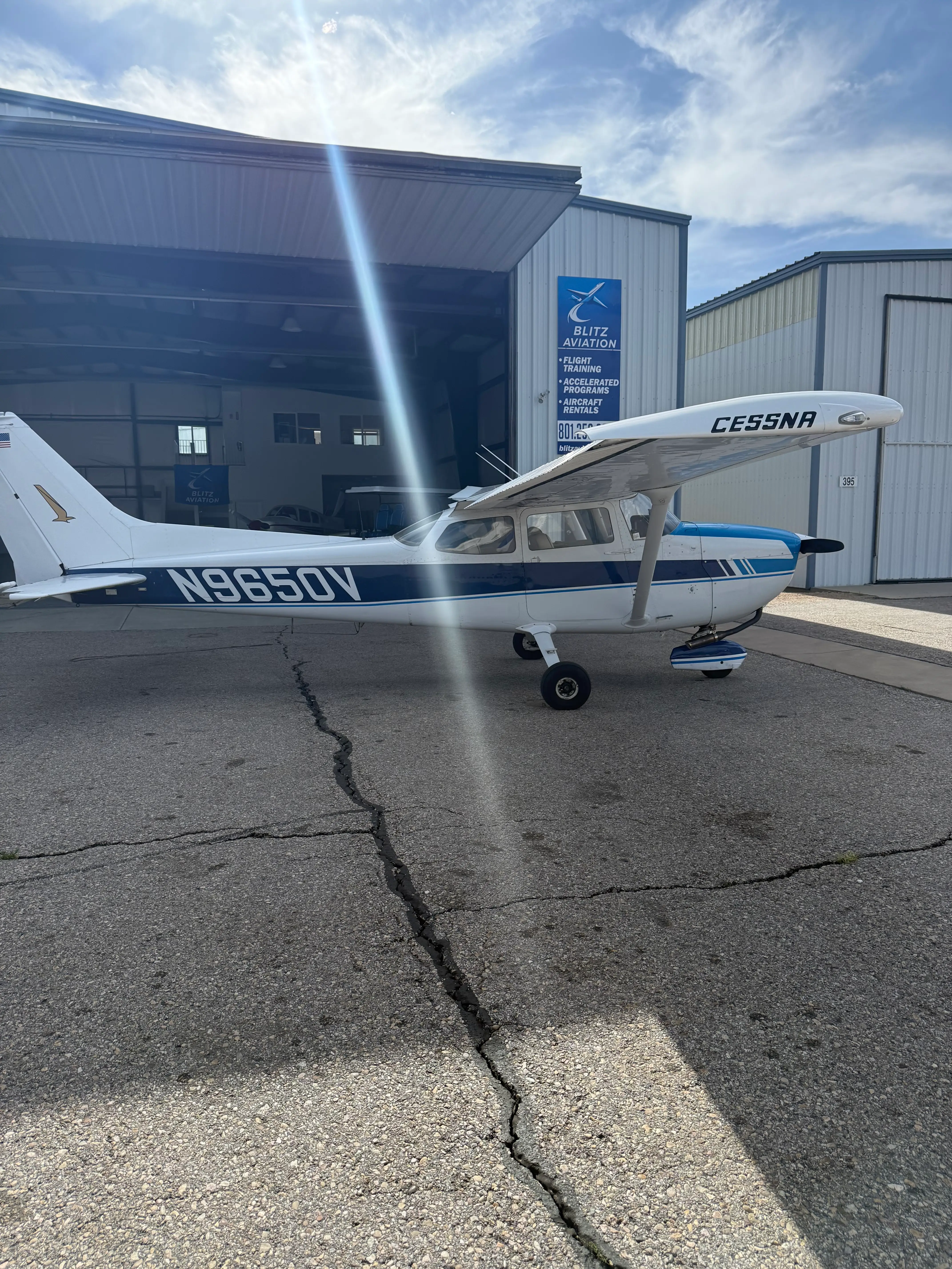 Side view of Cessna 172M in flight