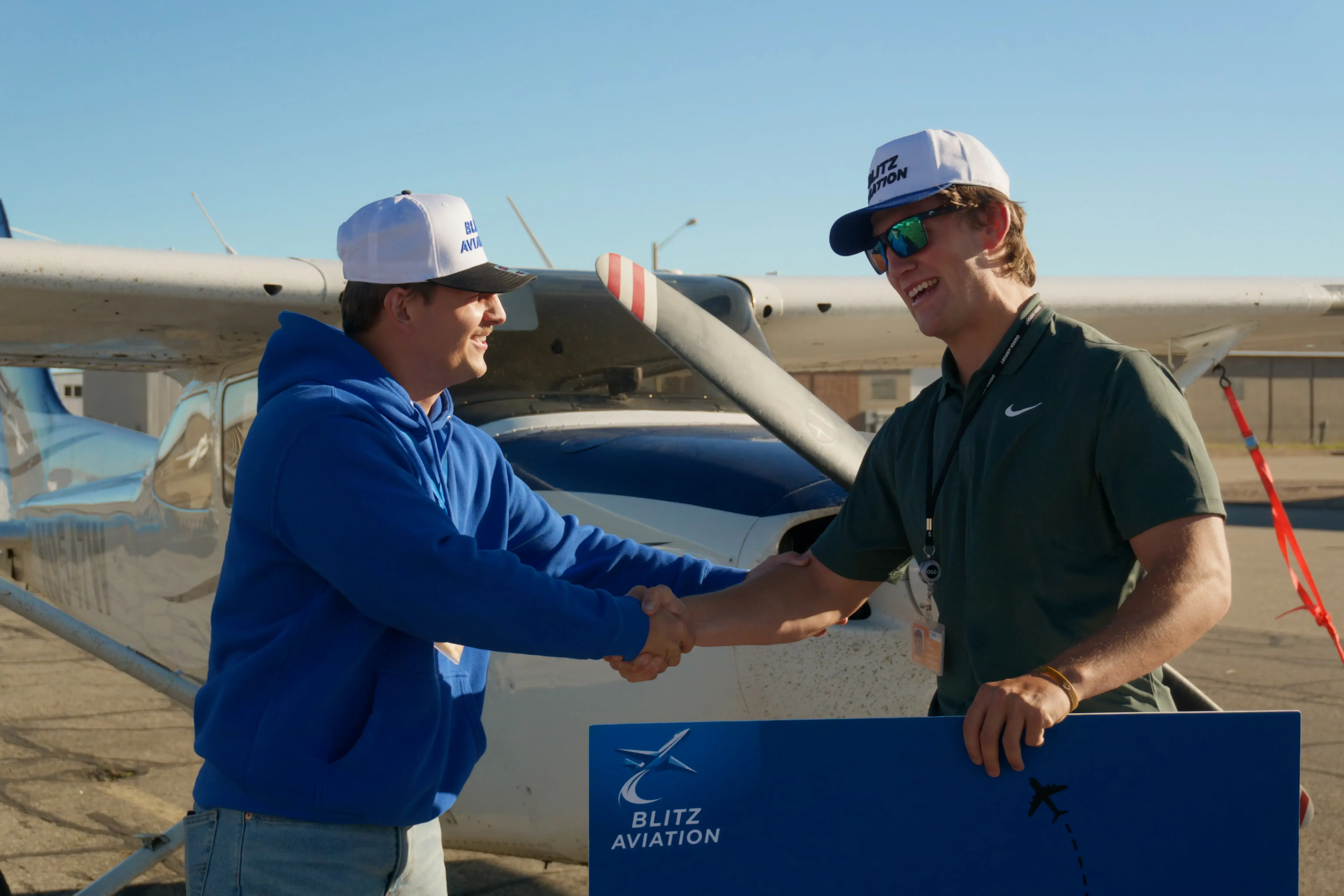 Student pulling Cessna out of the hangar at Blitz Aviation