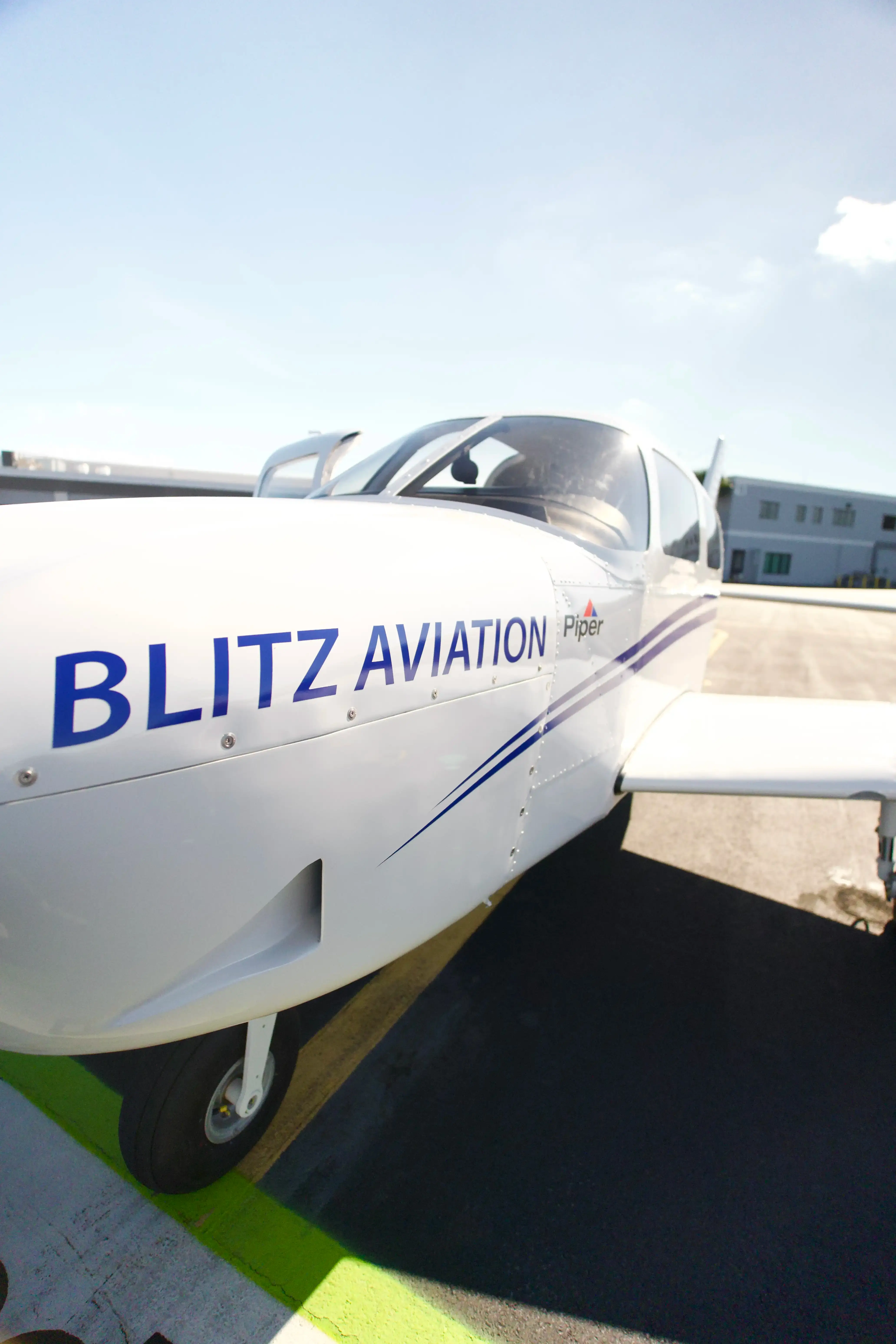 Nose of Piper Pilot 100i N402BL with Blitz Aviation lettering