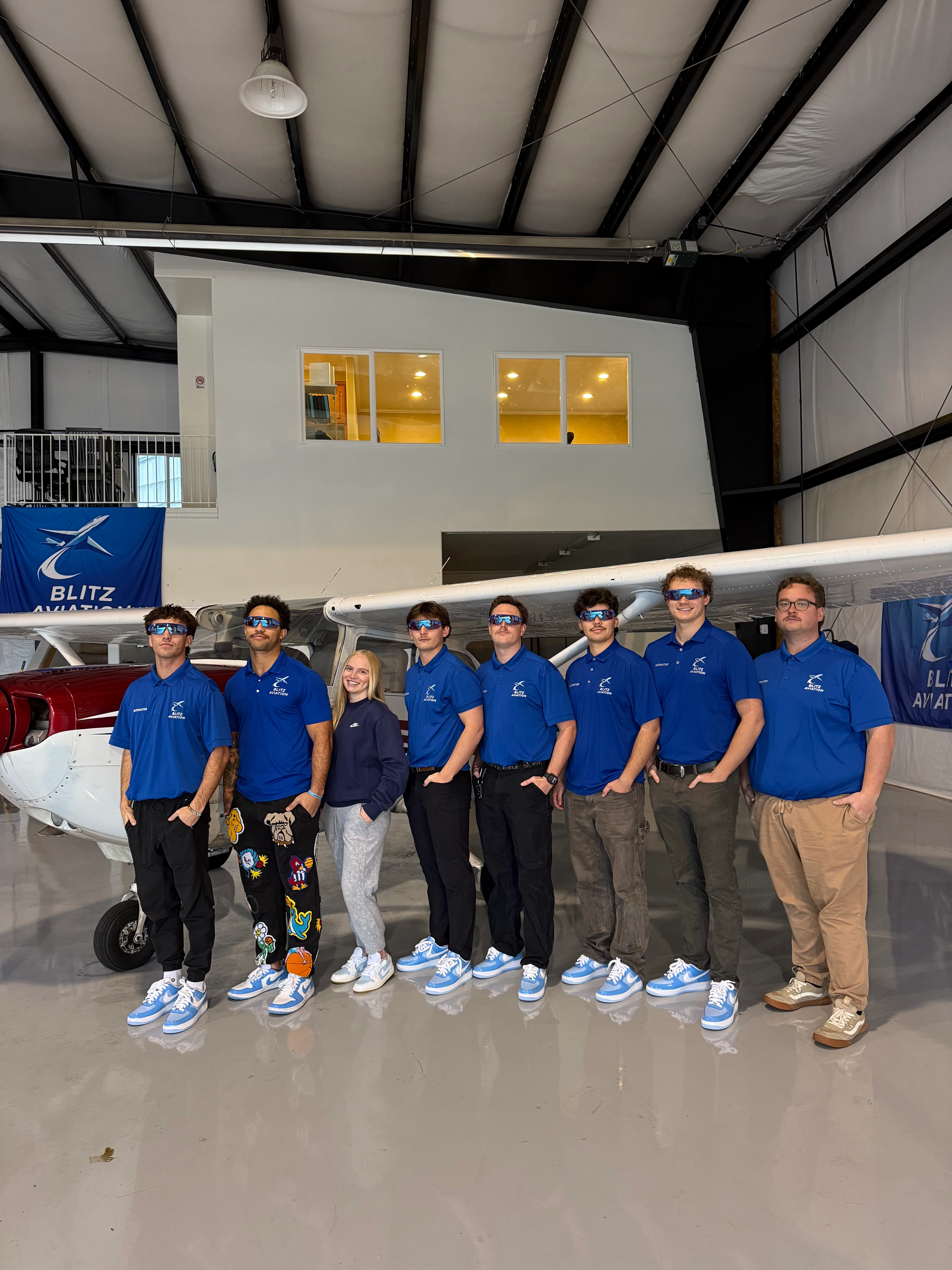 Blitz Aviation flight training team with training aircraft in Ogden, Utah